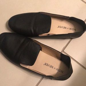 Black loafer like shoes